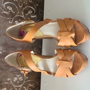 Like new, never worn, Michael Kors, Size 8.5 camel toned wedge sandals